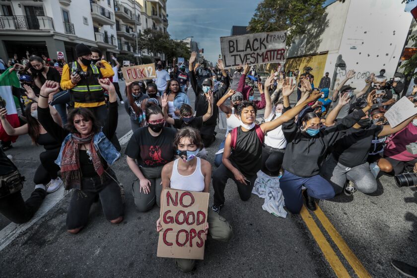 Santa Monica, CA, Sunday May 31, 2020 - Protestors face off with police downtown as unrest continues in the wake of the death of George Floyd in Minneapolis. (Robert Gauthier / Los Angeles Times)