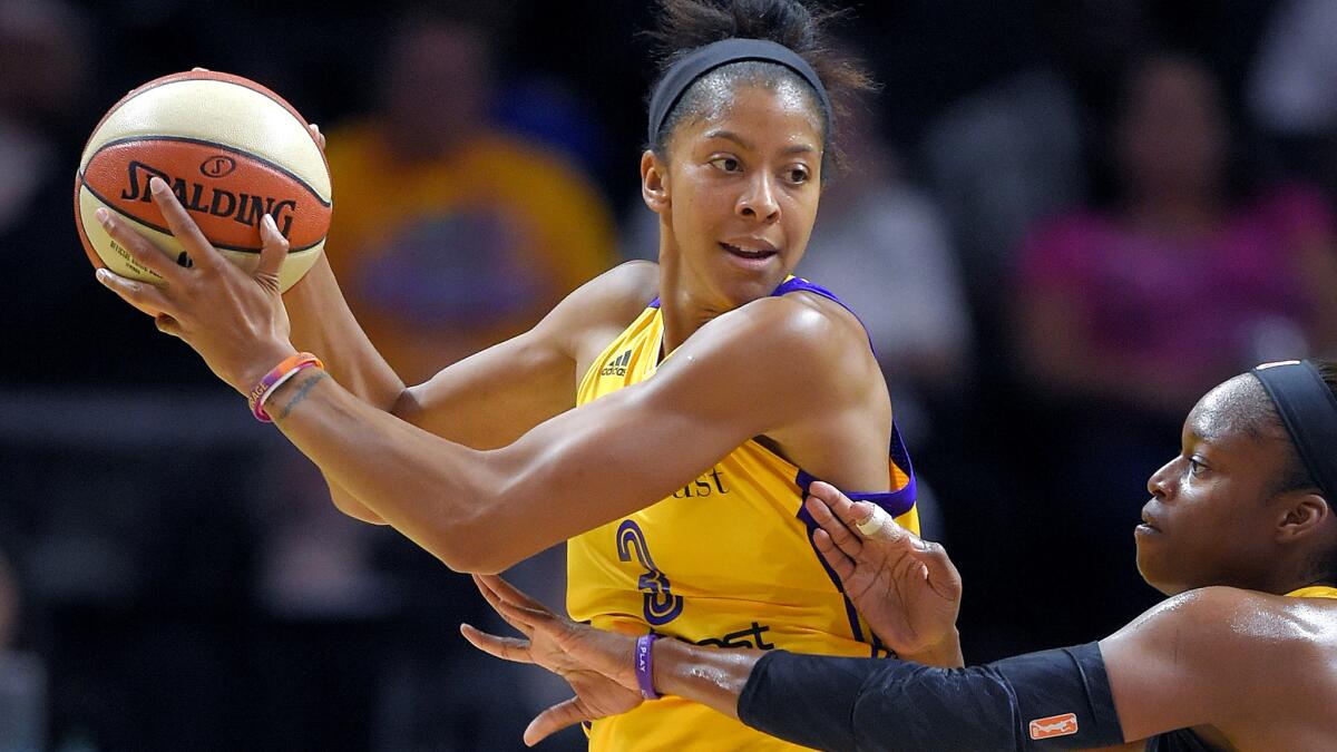 Sparks forward Candace Parker, shown during a game last season, had 34 points on Sunday.