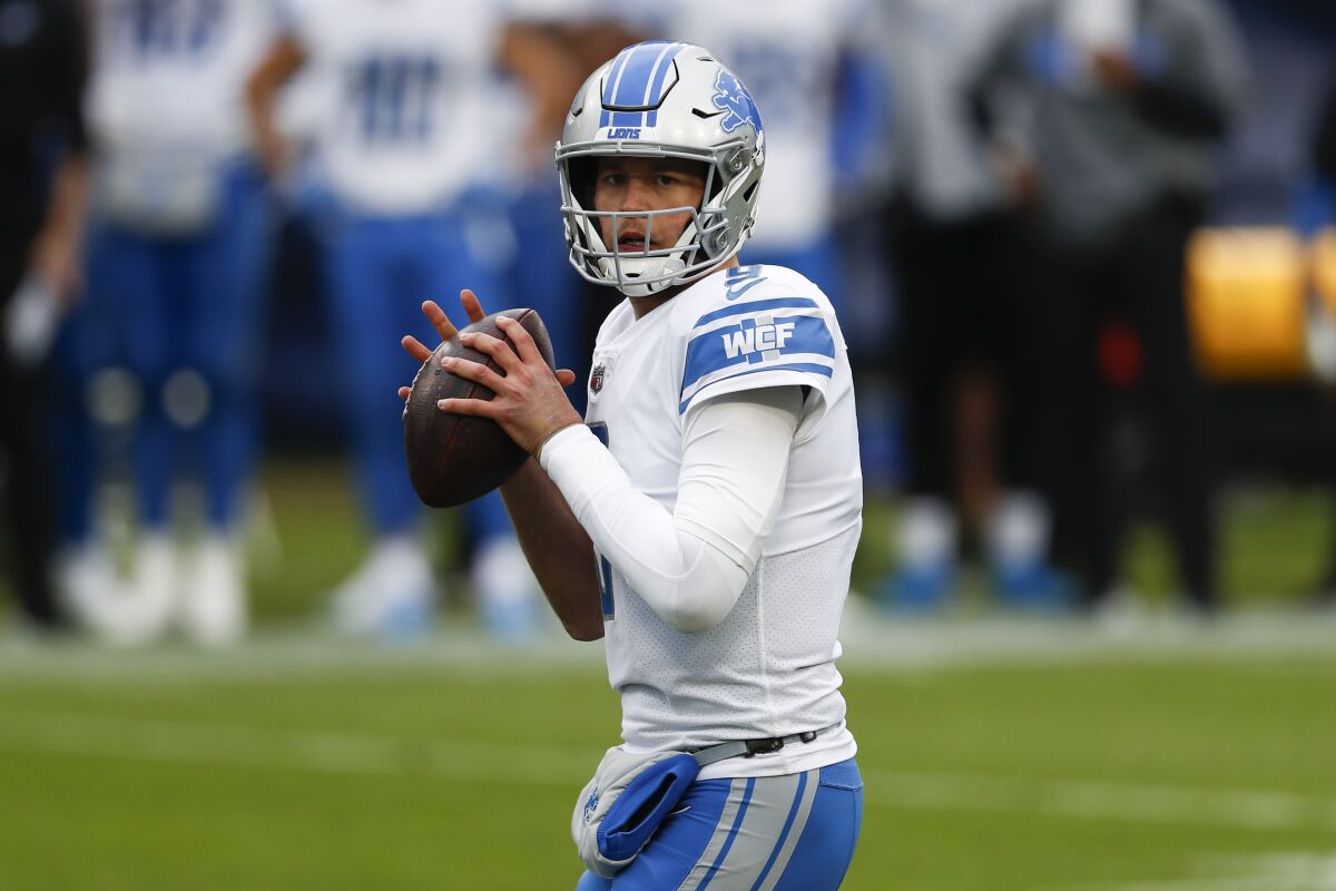 Quarterback Matthew Stafford looks to pass in December 2020 against the Tennessee Titans.