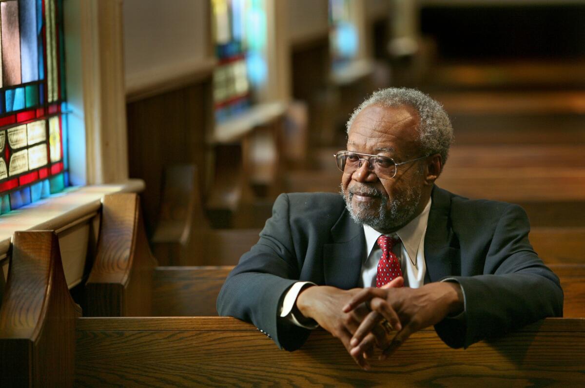 Rev. Joseph A. Darby, senior pastor at Morris Brown AME Church in Charleston, S.C., thinks about the election and his support of Democratic presidential candidate Sen. Barack Obama, D-Ill, at his church Friday, Oct. 31, 2008. (AP Photo/Mic Smith)