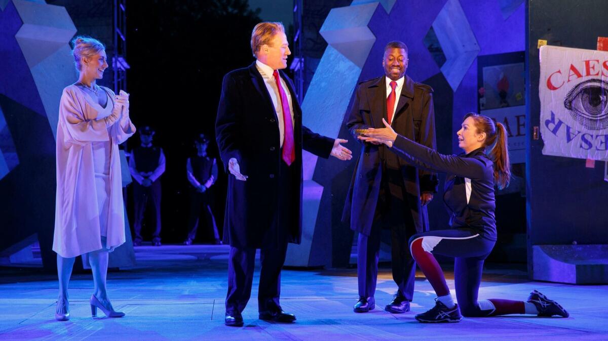 Gregg Henry, center left, portrays a President Trump-like Julius Caesar in the Public Theater's Shakespeare in the Park production of "Julius Caesar."