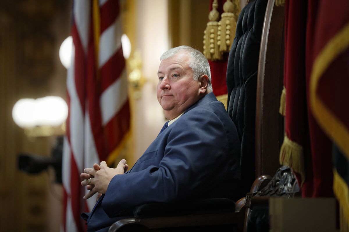 FILE - In this Wednesday, Oct. 30, 2019, file photo, Republican Ohio state Rep. Larry Householder sits at the head of a legislative session as Speaker of the House, in Columbus. Householder is charged in a $60 million bribery case, alleging he helped a $1 billion nuclear plant bailout. The 2020 arrests of Householder and four associates in connection with the scheme have rocked politics and business across Ohio. (AP Photo/John Minchillo, File)