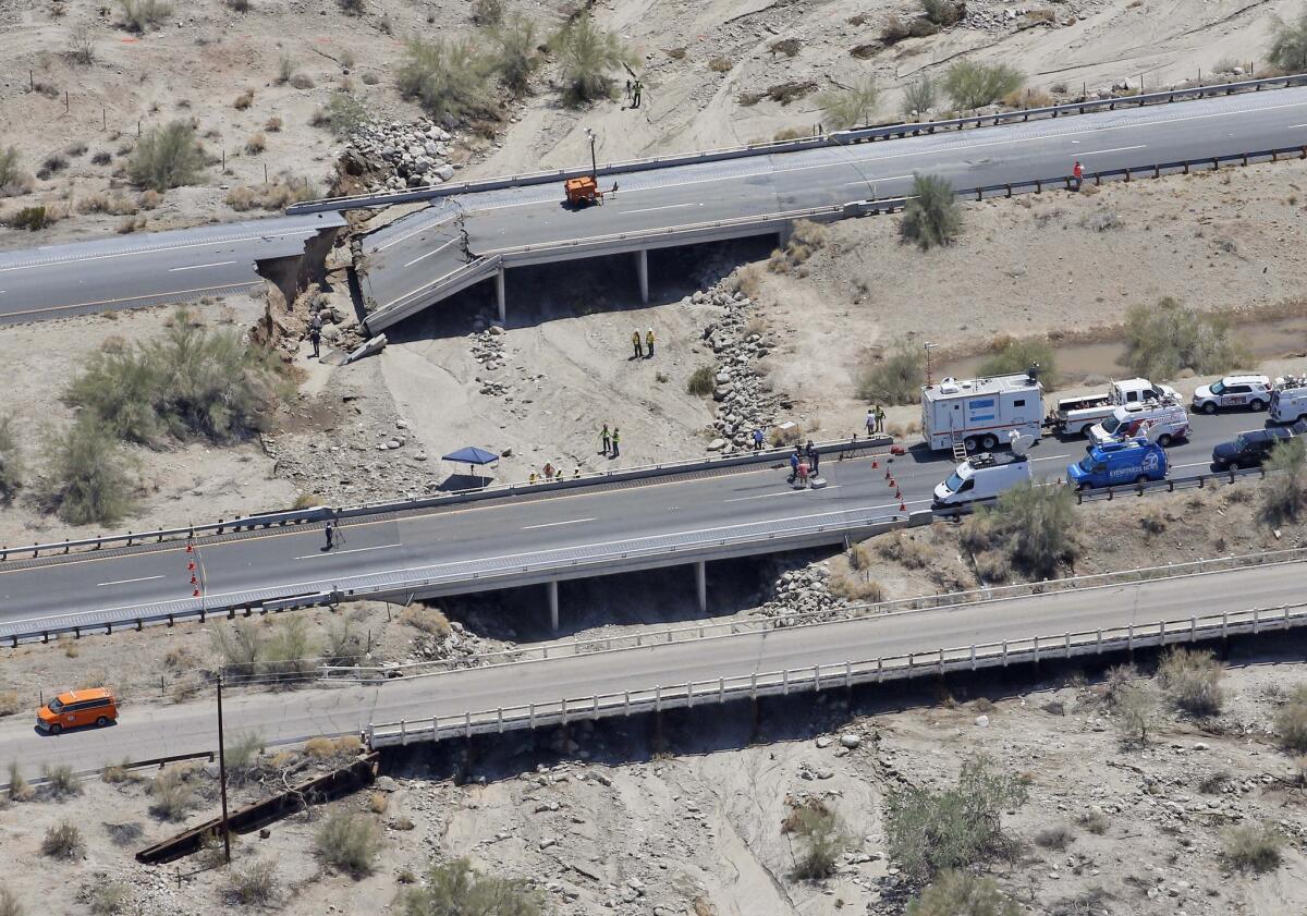 The collapsed elevated section of Interstate 10 at Tex Wash in Desert Center, Calif., on Monday, a day after heavy rain washed out the bridge.