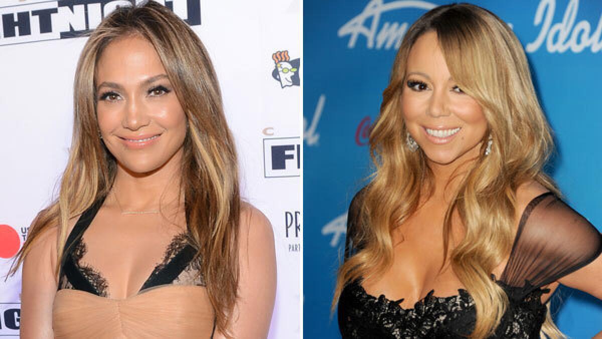 Jennifer Lopez, left, and Mariah Carey.