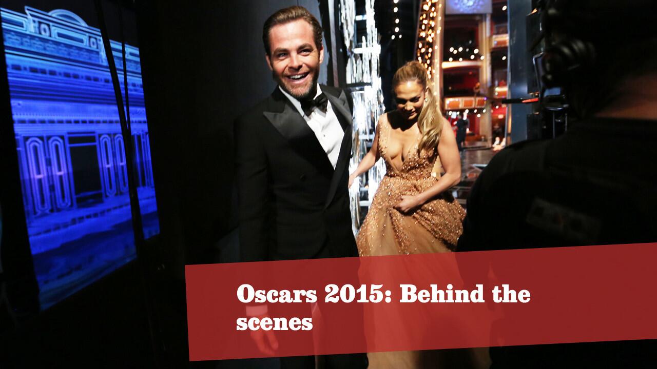 Actors Chris Pine and Jennifer Lopez make their way backstage. The pair presented the award for costume design. More Oscars: Full coverage | Complete list | The show | Red carpet | Quotes | Best & worst | Winners' room | Top nominees | Video Q&As
