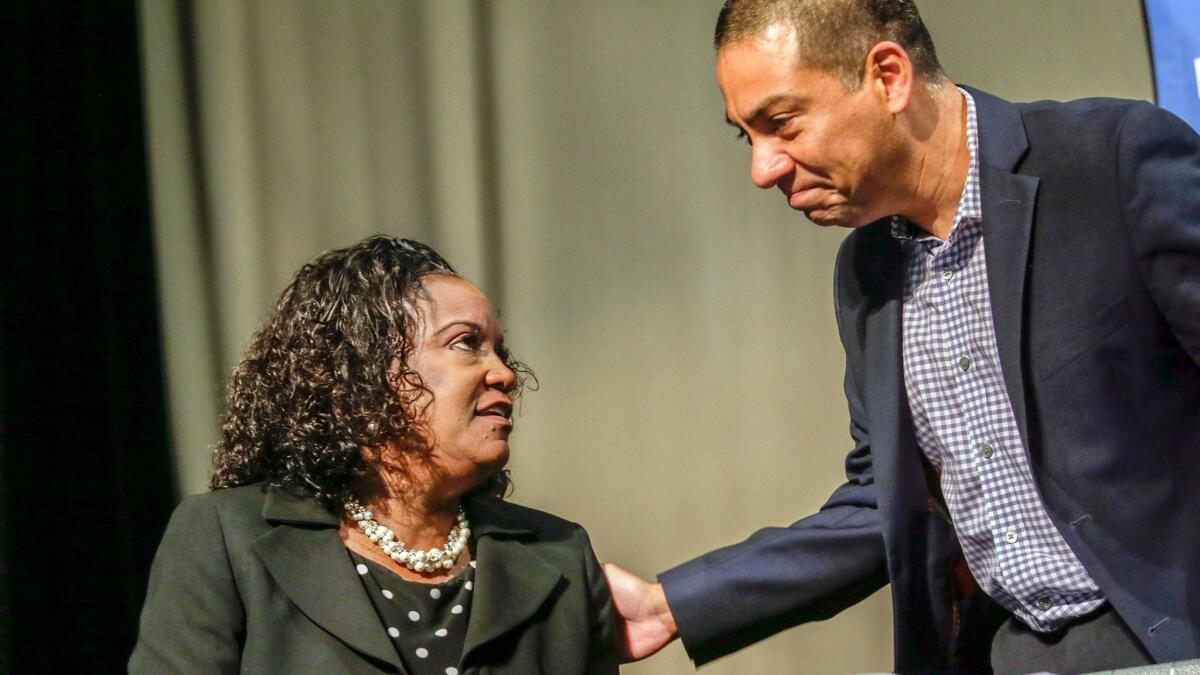 L.A. schools Supt. Michelle King, left, speaks at an event last year with Board of Education member Ref Rodriguez, the author of an emergency resolution Thursday to put "students first."