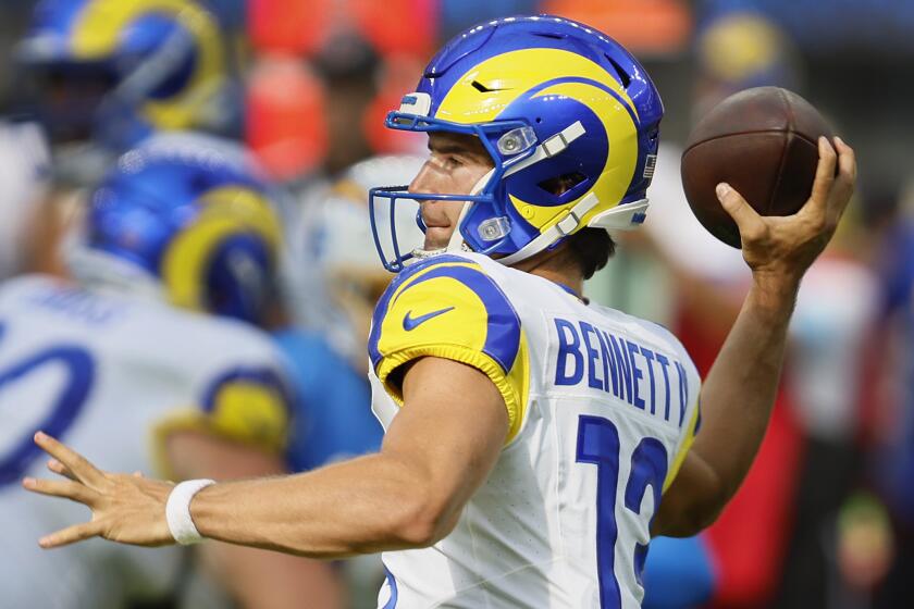 Inglewood, CA - August 17: Rams quarterback Stetson Bennett passes the ball.