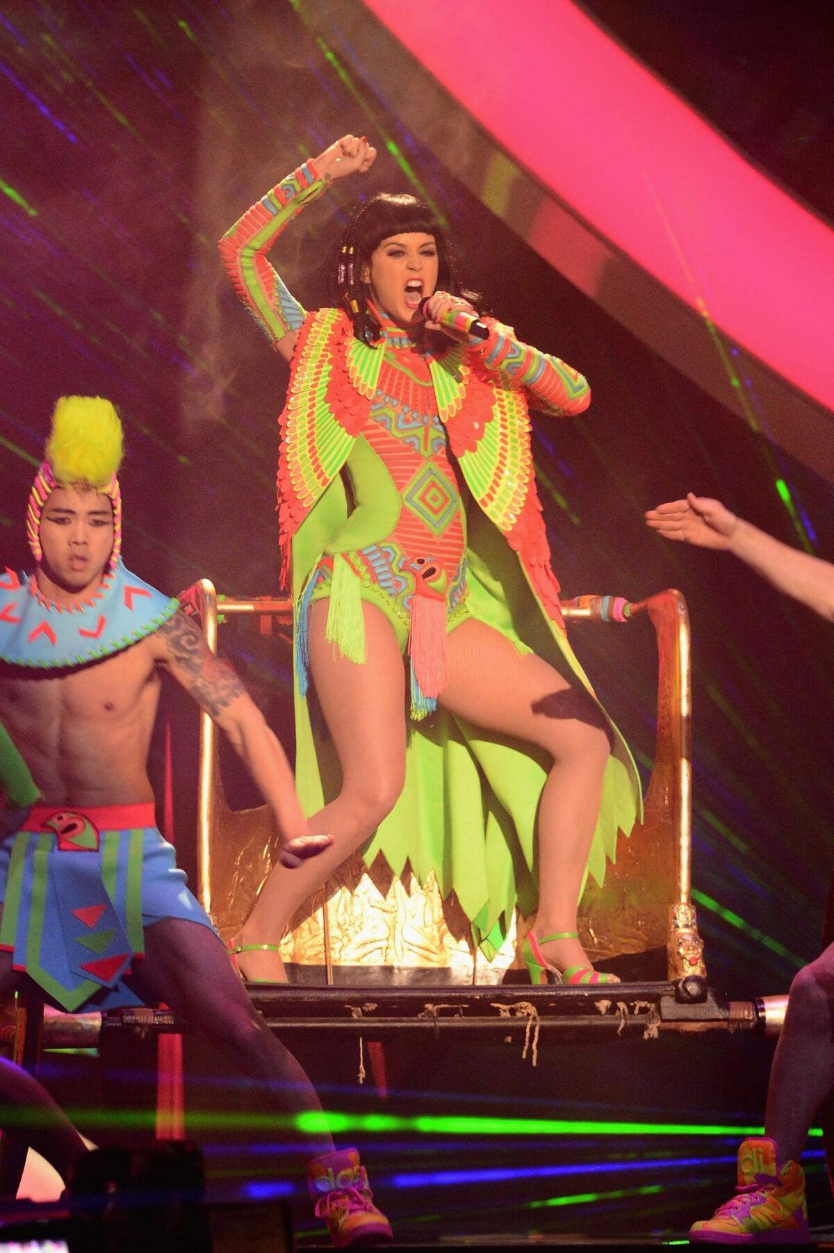 Singer Katy Perry performs at the Brit Awards 2014 in London wearing an Egyptian-inspired body suit by Nicolas Jebran.