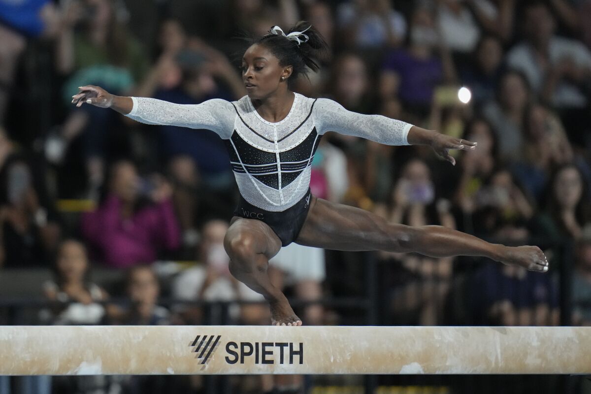 Simone Biles performs on the balance beam at the U.S. Classic gymnastics competition.