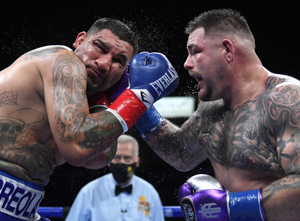 Andy Ruiz Jr., right, punches Chris Arreola during their heavyweight fight on Saturday.