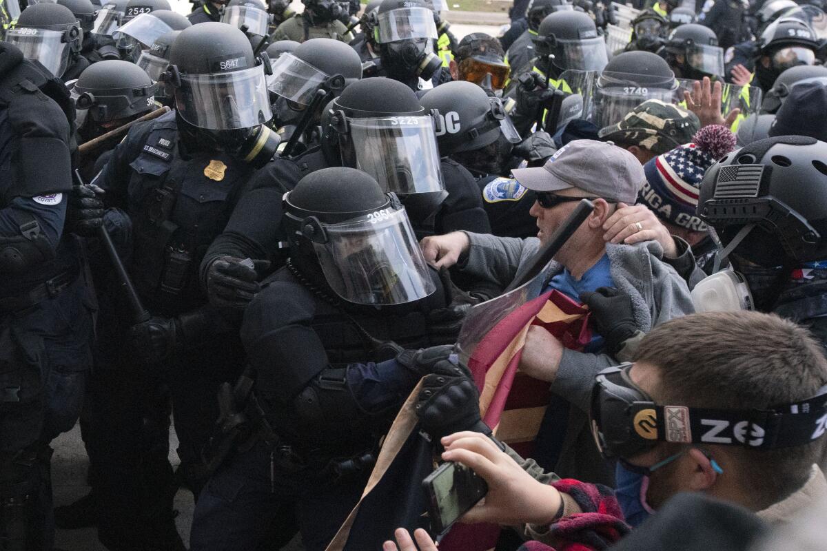Capitol police and rioters clash