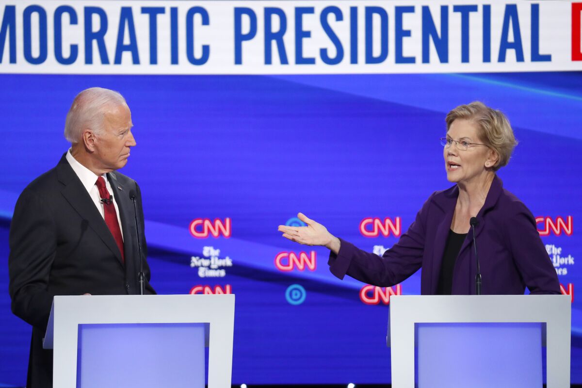 Democratic presidential candidate former Vice President Joe Biden and Sen. Elizabeth Warren, D-Mass., participate in a Democratic presidential primary debate hosted by CNN/ and the New York Times at Otterbein University, Tuesday in Westerville, Ohio.