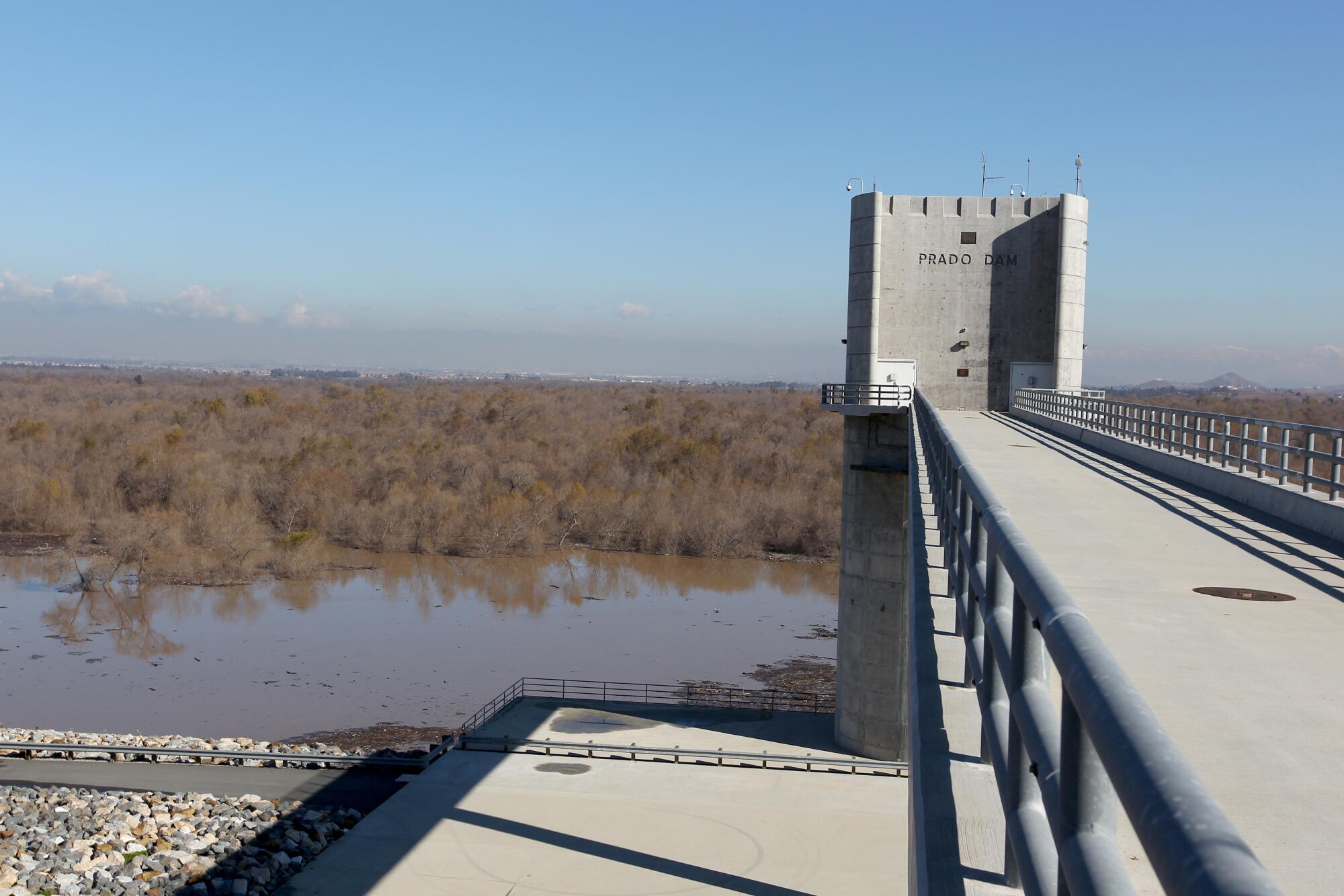 Prado Dam holds back recent storm water