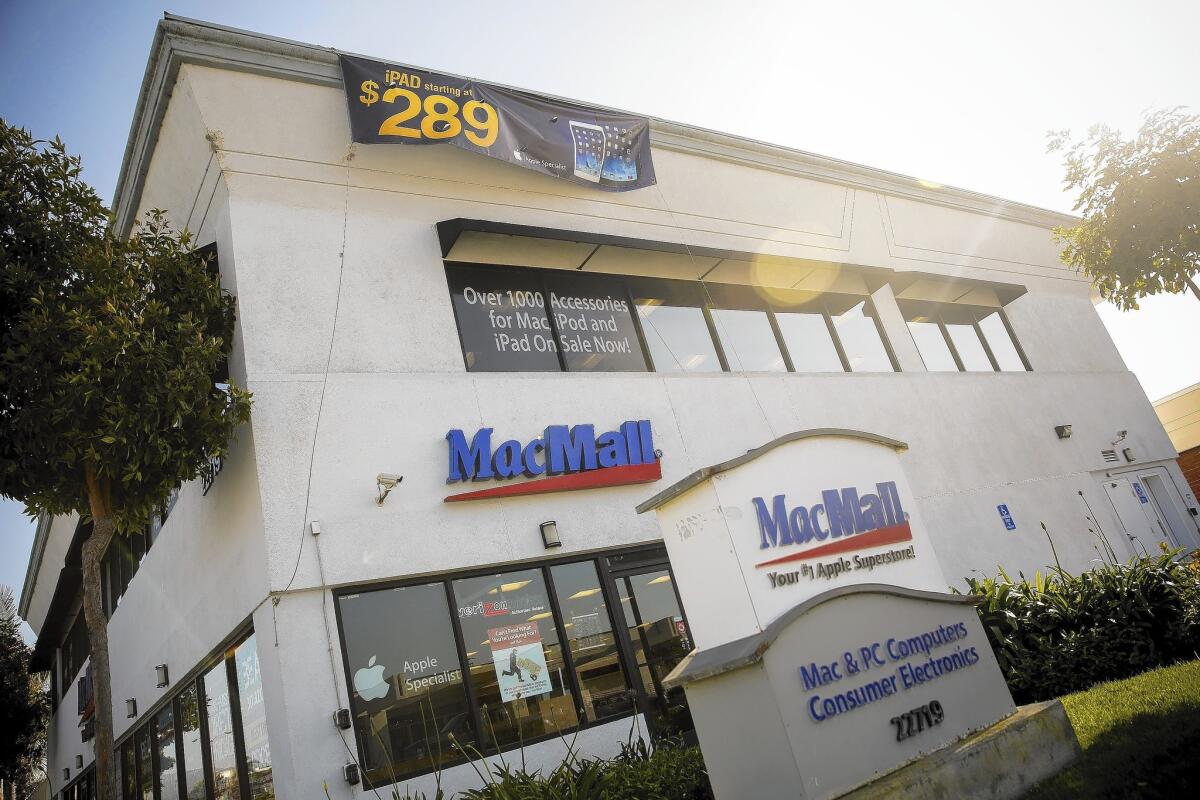 PCM’s most visible brand is the MacMall retail stores it operates in Torrance, Santa Monica, Huntington Beach and Chicago, where it sells computers, tablets and other devices directly to the public. Above, a MacMall store in Torrance.