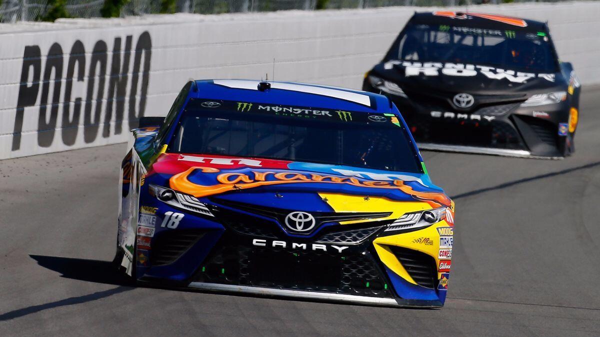 Kyle Busch leads Martin Truex Jr. here during the Overton's 400 on July 30, but he's chasing him in the Cup Series points race.