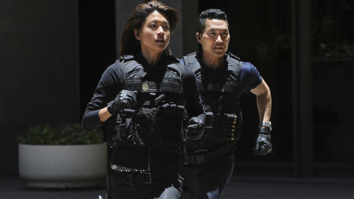 Grace Park, left, and Daniel Dae Kim quit CBS' "Hawaii Five-0" amid claims of pay inequity. CBS says both were offered "significant salary increases."