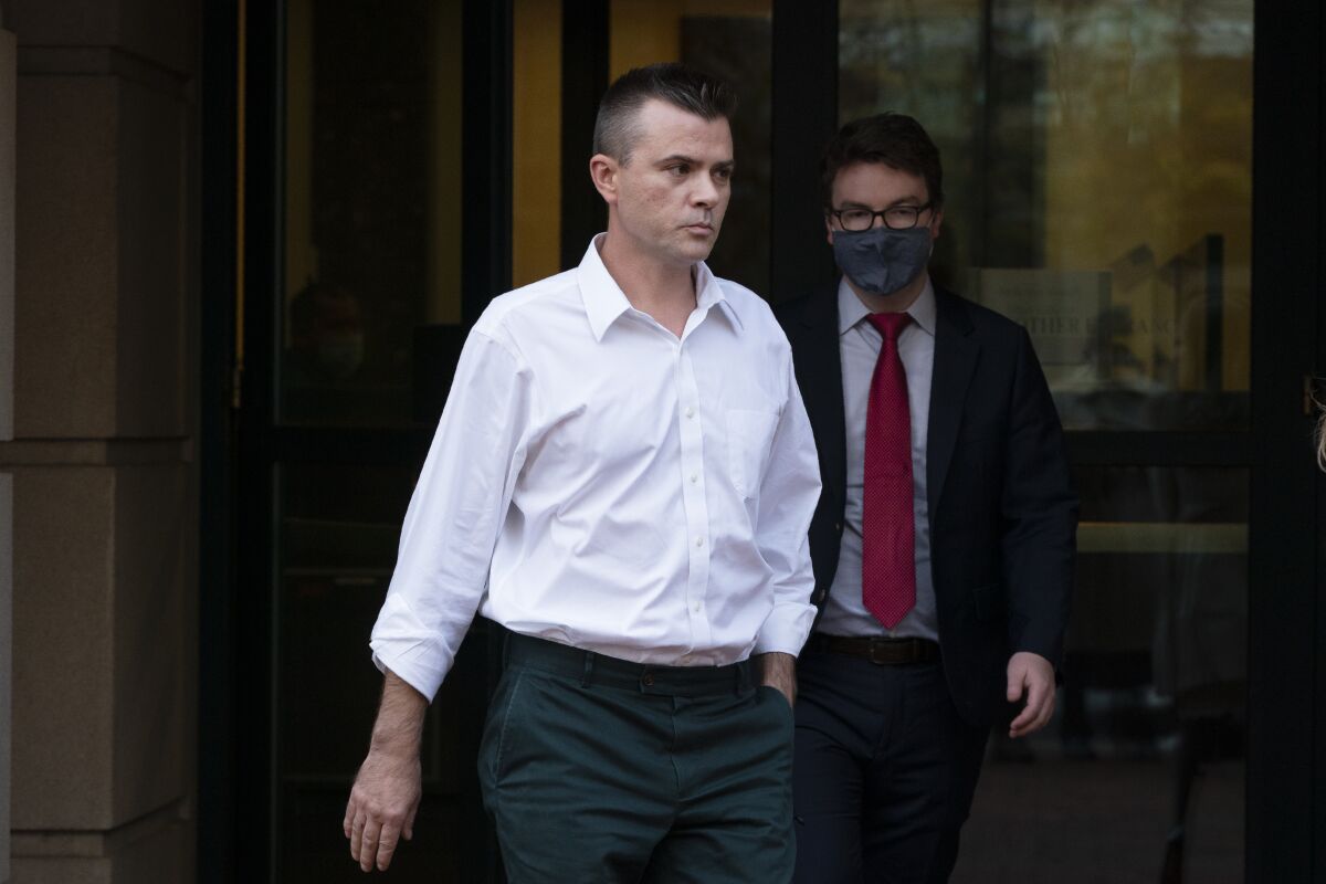 Igor Danchenko leaves Albert V. Bryan United States Courthouse in Alexandria, Va., Thursday, Nov. 4, 2021. Danchenko, a Russian analyst who contributed to a dossier of Democratic-funded research into ties between Russia and Donald Trump, was arrested Thursday on charges of lying to the FBI about his sources of information, among them an associate of Hillary Clinton. (AP Photo/Manuel Balce Ceneta)
