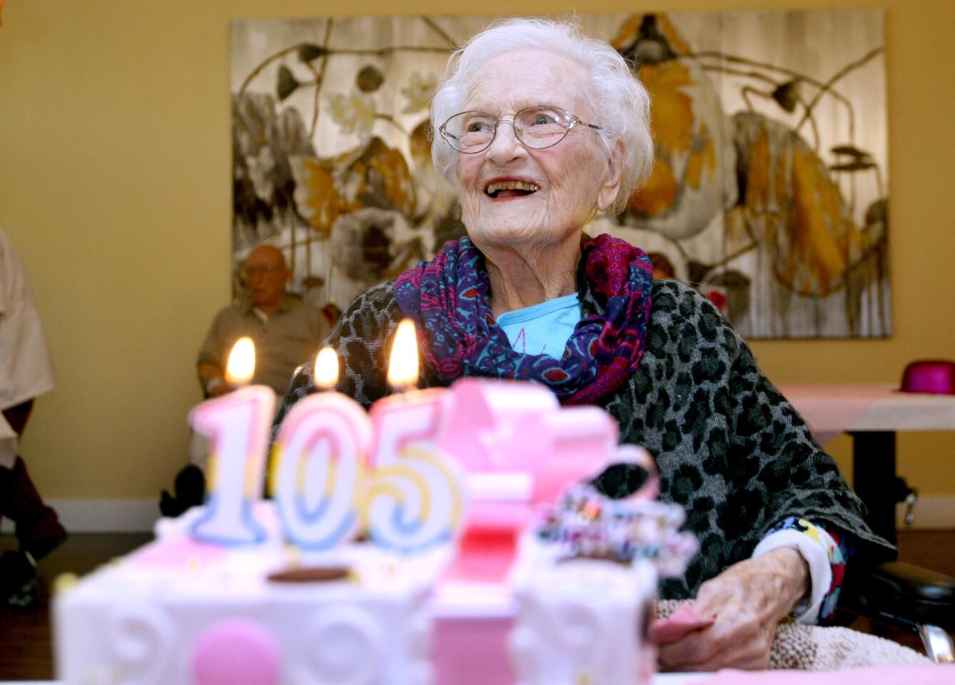 Helen Broderson celebrates her 105th birthday with a cake and friends at Autumn Hills Health Care Center in Glendale on Wednesday, Feb. 3, 2016. Broderson was born in Rockford, Ill., on Feb. 3, 1911 and has lived in Glendale since the late 1950's.
