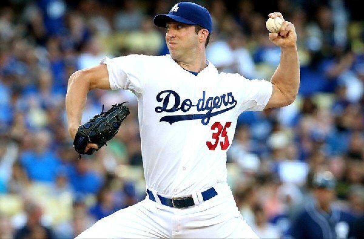 Dodgers pitcher Chris Capuano, who went seven innings in his previous start against the Padres Saturday, couldn't make it out of the second inning against the Reds on Friday because of an injury.