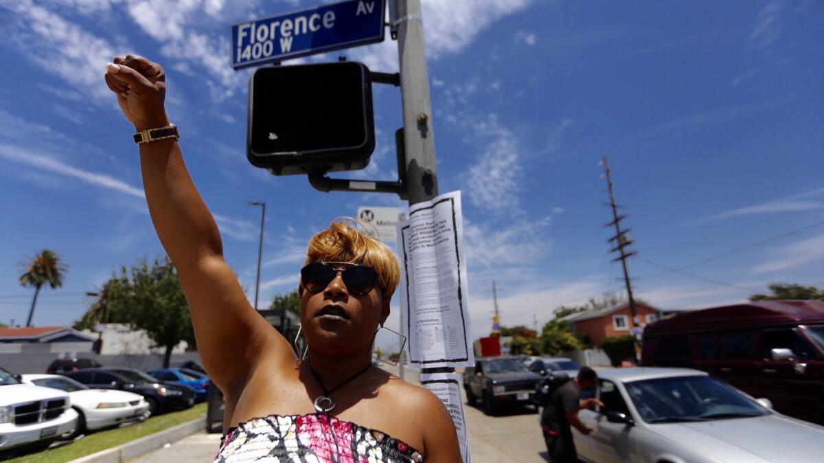 Jelecia Smith, 23, of Los Angeles, felt compelled to join a small protest at Florence and Normandie in Los Angeles on July 9.