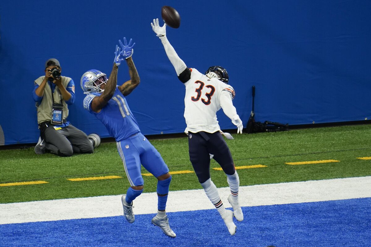 Chicago Bears cornerback Jaylon Johnson (33) breaks up a pass intended for Detroit Lions wide receiver Marvin Jones (11) in the end zone in the fourth quarter of an NFL football game in Detroit, Sunday, Sept. 13, 2020. Chicago won 27-23. (AP Photo/Paul Sancya)
