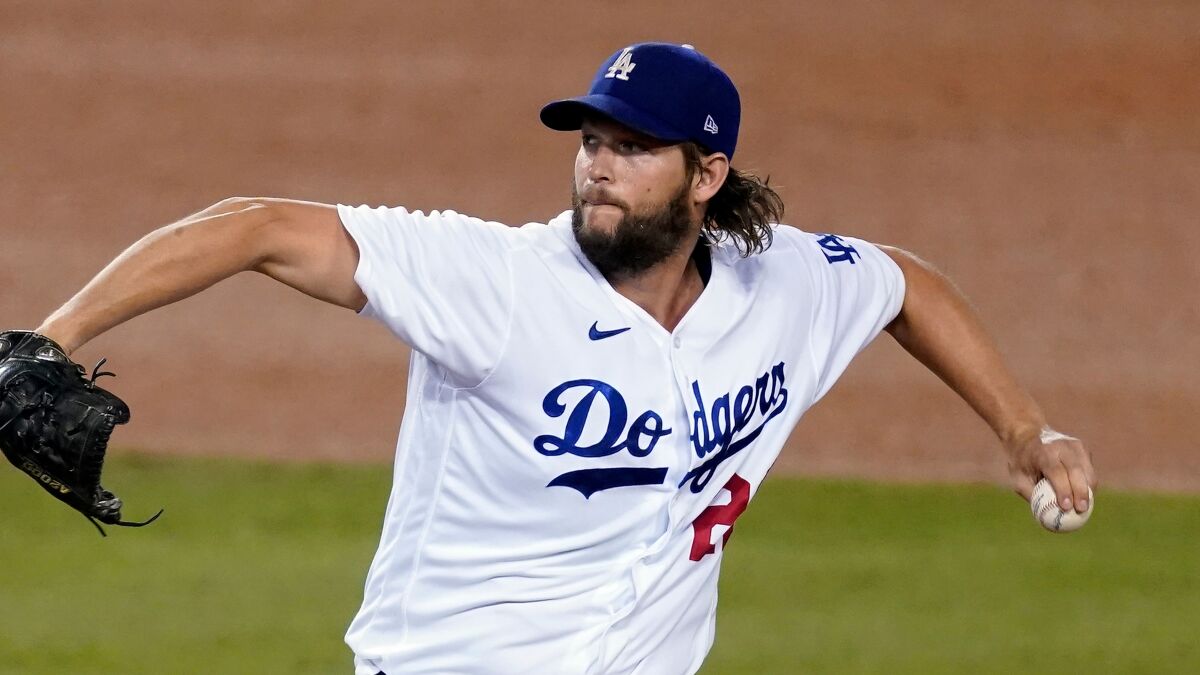 Dodgers starter Clayton Kershaw pitches against the Milwaukee Brewers on Oct. 1 in Los Angeles.