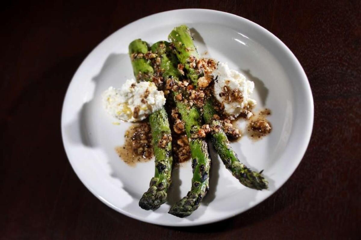 Fat Delta asparagus with Jersey cow's milk ricotta, pounded hazelnuts and lemon zest at Cooks County restaurant.