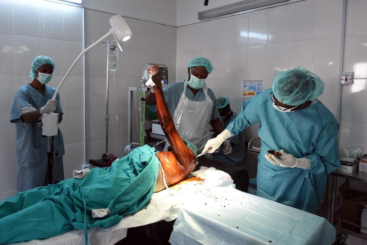 A man undergoes surgery in a hospital ward after being injured in an attack by Boko Haram militants in Maiduguri, capital of northeastern Nigeria's Borno state in February 2016.