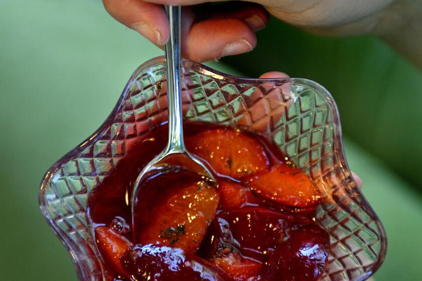 Stonefruit plums, grilled Santa Rosa plums with mint sugar. Santa Maria Barbecue grilling cover issue. June 23, 2005. (LOS ANGELES TIMES PHOTO BY KEN HIVELY)