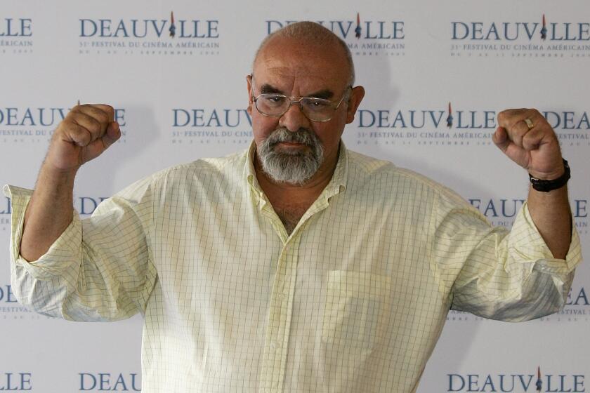 FILE - In this Sept. 9, 2005 file photo, U.S. Director Stuart Gordon poses during a photocall for the presentation of his film "Edmond" at the 31st Deauville Festival of American Film, in Deauville, Normandy, France. Gordon will be one of the special guests of the 15th edition of the International Horror Film Festival Macabro. The festival will be held from Aug. 23 – 31, 2016 in Mexico City. (AP Photo/Francois Mori, File)