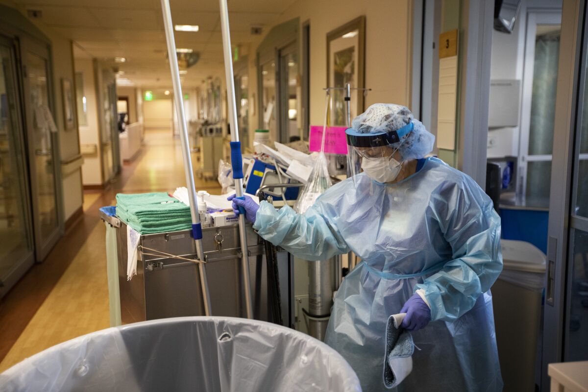 A healthcare worker wearing protective equipment
