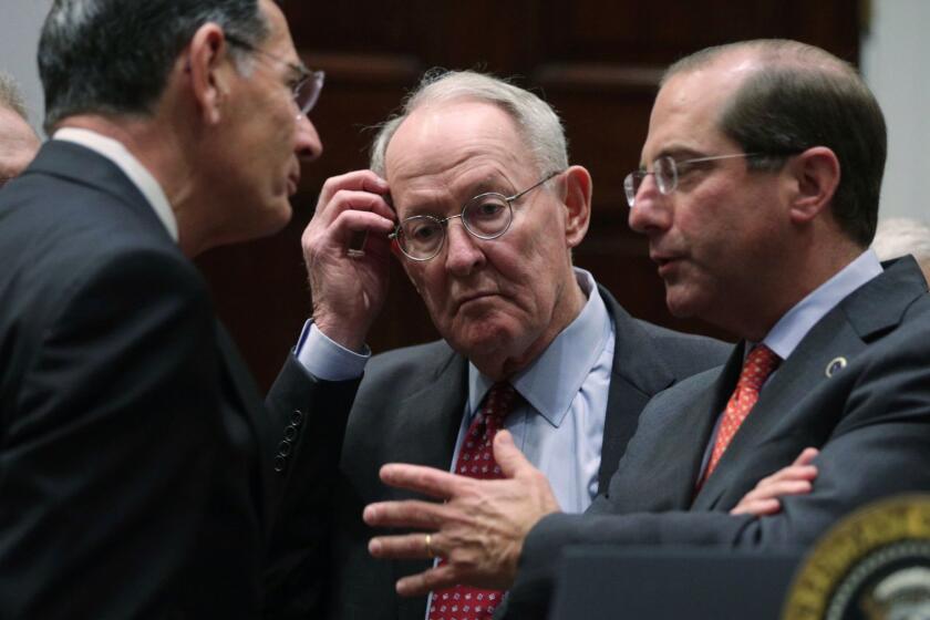 WASHINGTON, DC - MAY 09: U.S. Sen. Lamar Alexander (R-TN) (C) listens as Secretary of Health and Human Services Alex Azar (R) talks to Sen. John Barrasso (R-WY) (L) prior to a Roosevelt Room event at the White House May 9, 2019 in Washington, DC. The Trump administration is requiring drug manufacturers to disclose the list price of any drug covered by Medicare or Medicaid with a cost of $35 or more per month. (Photo by Alex Wong/Getty Images) ** OUTS - ELSENT, FPG, CM - OUTS * NM, PH, VA if sourced by CT, LA or MoD **