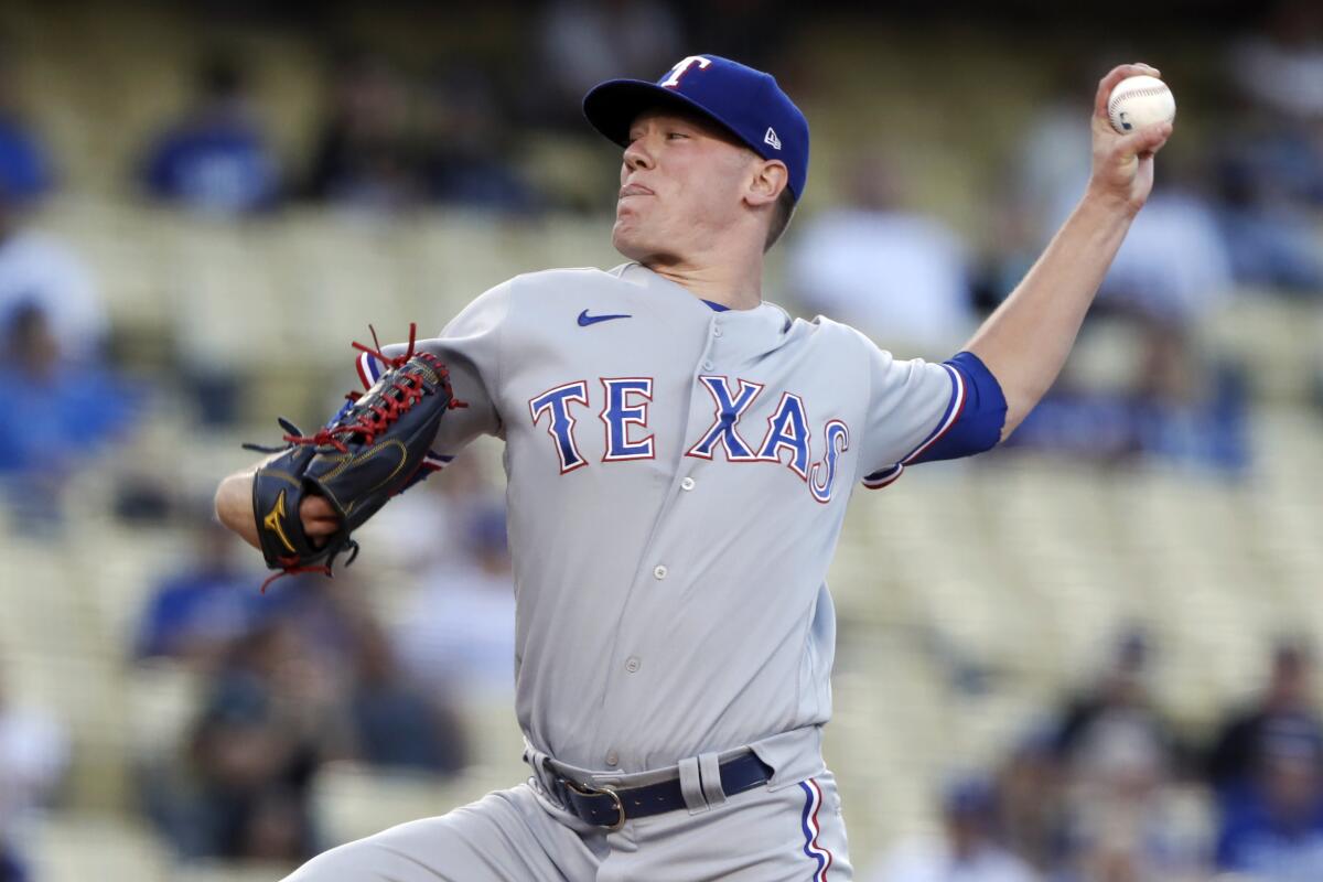 Texas Rangers starting pitcher Kolby Allard delivers against the Dodgers in the first inning Saturday.