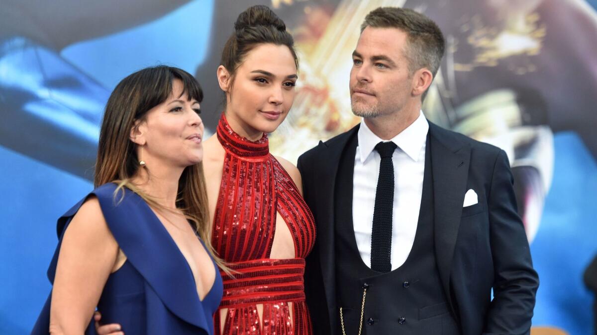 "Wonder Woman" director Patty Jenkins, left, with stars Gal Gadot and Chris Pine. (Frazer Harrison / Getty Images)