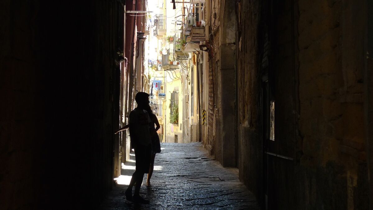 Naples, Italy, is the setting for Elena Ferrante's novels. The pseudonymous author has written an autobiography of sorts.