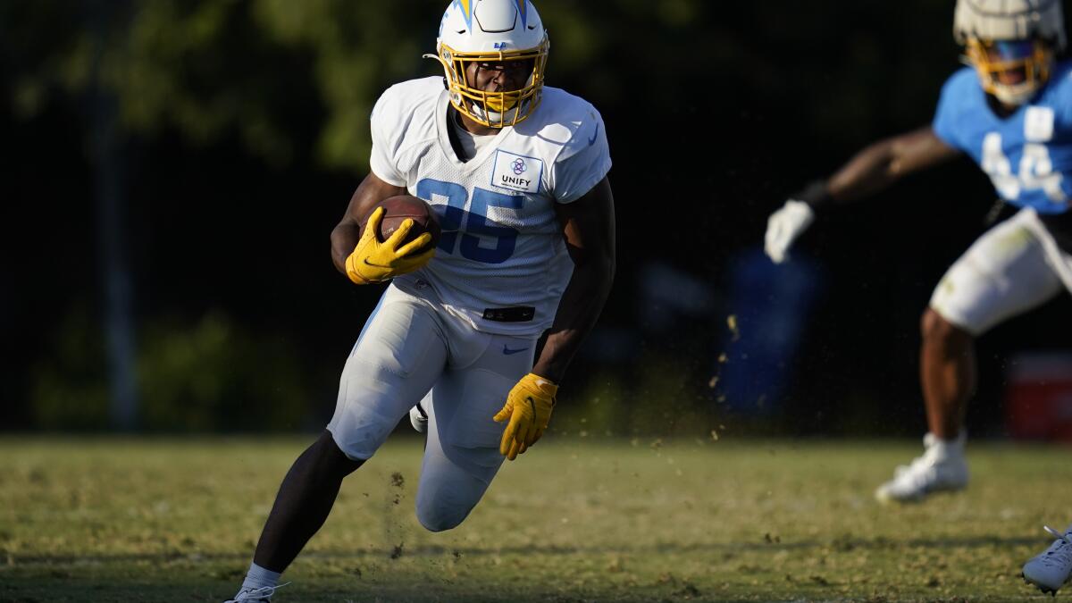 September 25, 2022 Los Angeles Chargers running back Joshua Kelley (25)  carries the ball during the NFL football game between the Los Angeles  Chargers and the Jacksonville Jaguars at SoFi Stadium in