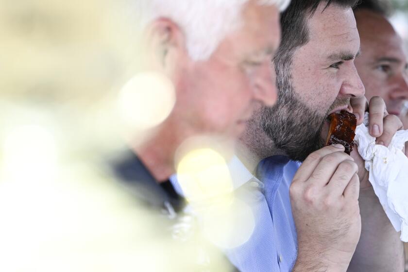 JD Vance, co-founder of Narya Capital Management LLC and U.S. Republican Senate candidate for Ohio, participates in a rib eating contest during a campaign event at the Ohio State Fair in Columbus, Ohio, US, on Tuesday, Aug. 2, 2022. A venture capitalist known for writing Hillbilly Elegy, backed by billionaire Peter Thiel and endorsed by former President Donald Trump, Vance is looking to replace retiring GOP Senator Rob Portman. Photographer: Gaelen Morse/Bloomberg via Getty Images