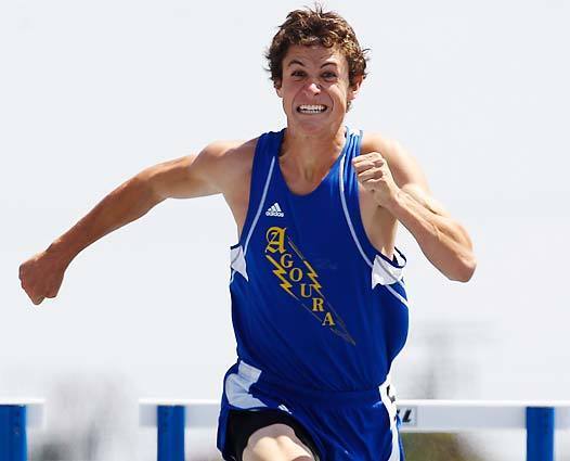 Agoura senior Jonathan Cabral wins the 110-meter high hurdles during the 2011 CIF Southern Section track and field Division 3 finals at Cerritos College on Saturday. He won in 13.54 seconds, breaking the old record of 13.65 held by Steve Kerho of Mission Viejo since 1982.