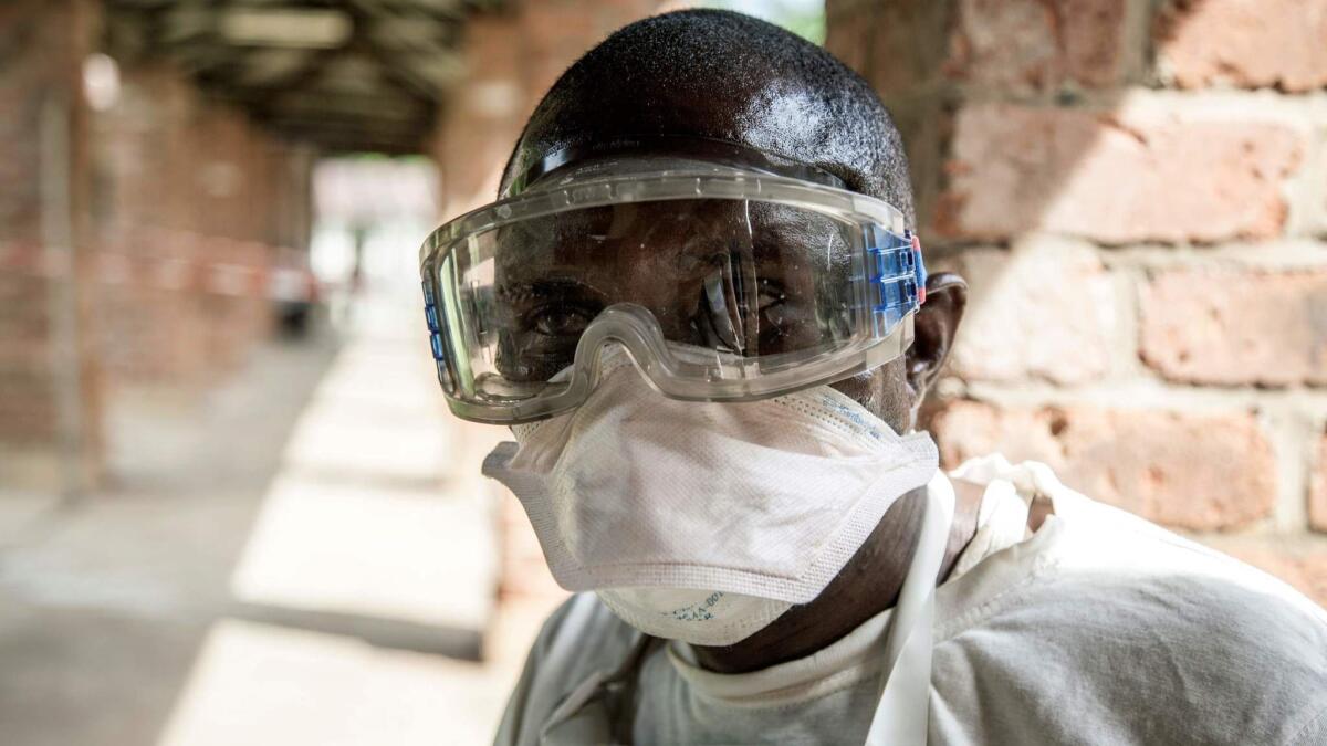 A health worker wears protective equipment at Bikoro Hospital in the Democratic Republic of Congo on May 12.
