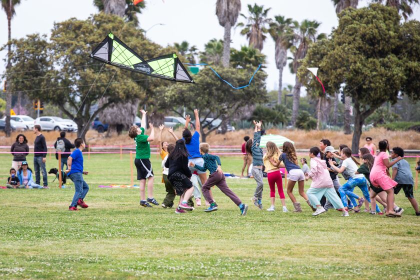 Children play Chase the Tail at the Ocean Beach Kite Festival on May 20.