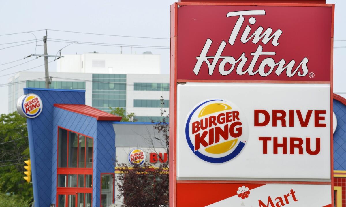 Canadian coffee-and-doughnuts chain Tim Hortons is being acquired by Miami-based Burger King, which now becomes a Canadian company. Americans offended by the defection pledge to boycott BK.