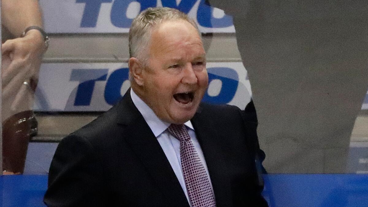 Randy Carlyle coaches the Ducks during a preseason game against the Kings at Honda Center on Oct. 2.