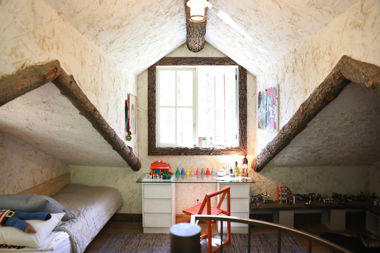 A dormer window in the children's bedroom