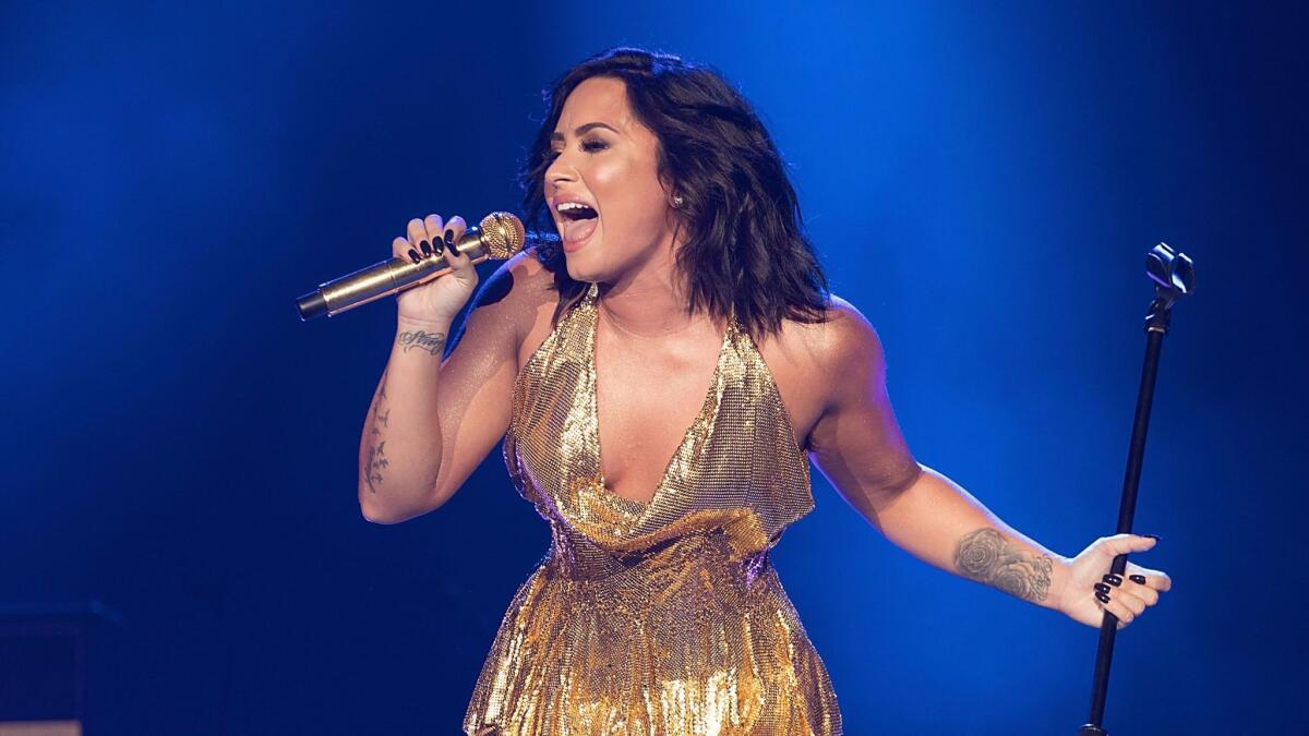 Demi Lovato performs onstage during BeautyKind Unites: Concert for Causes.