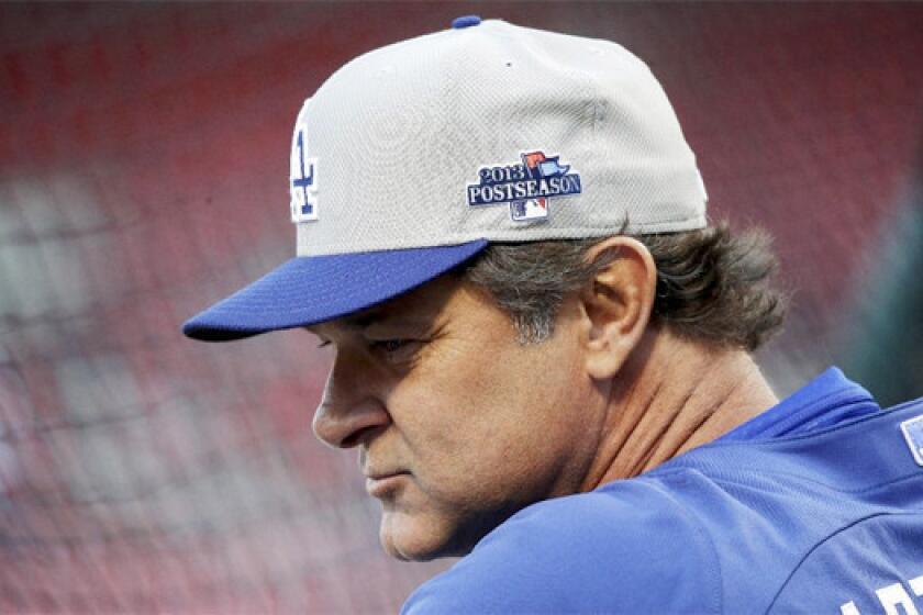 Dodgers Manager Don Mattingly finished second in voting for the NL manager of the year award behind Pittsburgh's Clint Hurdle, who helped guide his team to its first postseason appearance in 21 years.