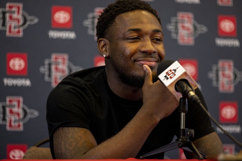 San Diego, CA - March 28: San Diego State University Men's Basketball players Darrion Trammell speaks to the media at a press conference at the Parma Payne Goodall Alumni Center at SDSU on Tuesday, March 28, 2023 in San Diego, CA. The team is headed to Houston this week for the school's first ever trip to the Final Four round of the NCAA tournament. (Sam Hodgson / The San Diego Union-Tribune