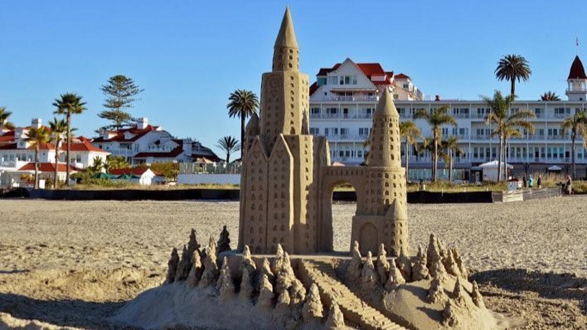 Is a beach vacation a fleeting moment that will be washed away like this sandcastle at Hotel del Coronado, or is it a memory for the ages?