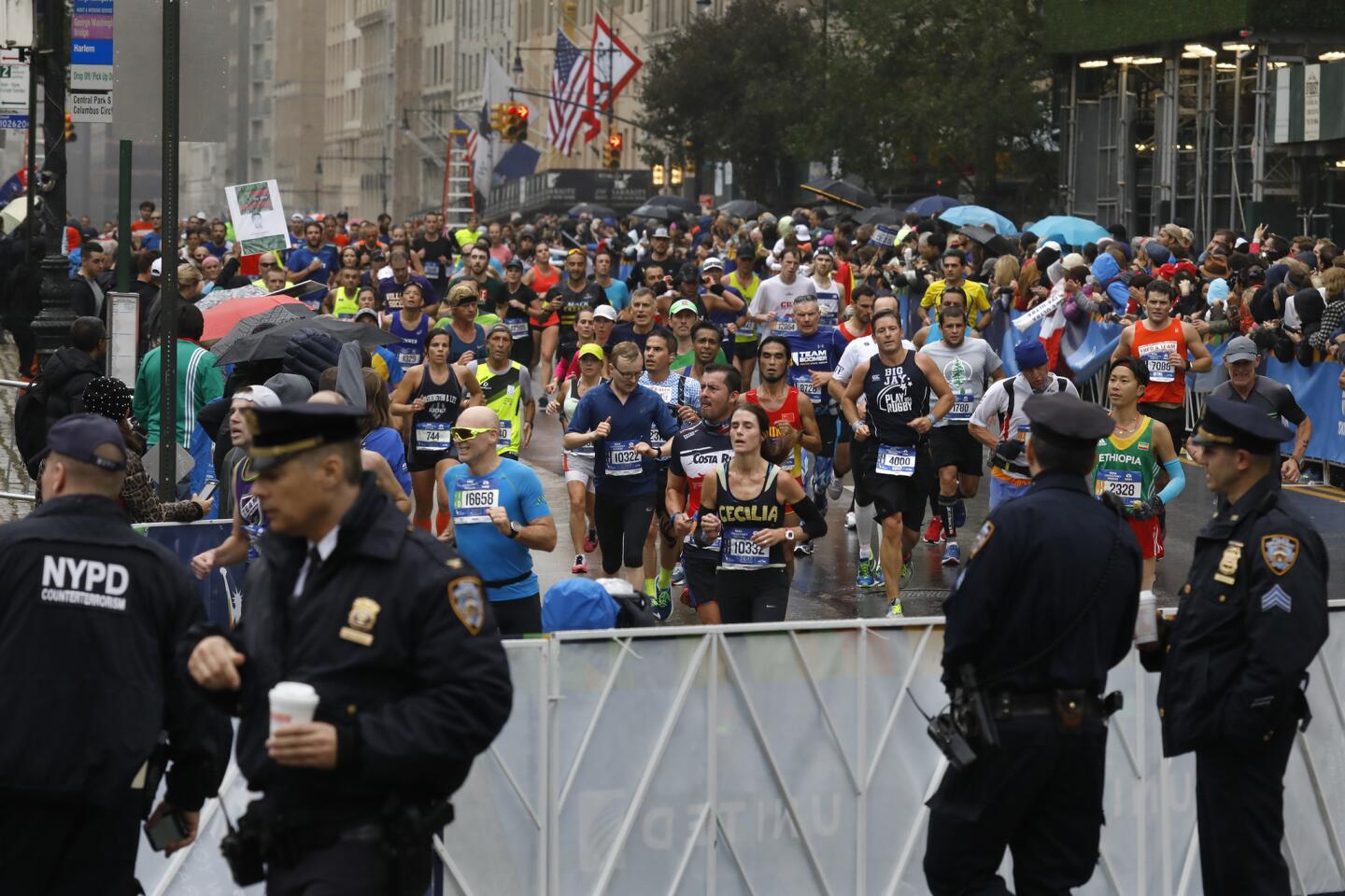 New York City police at Columbus Circle as runners approach the marathon finish line.