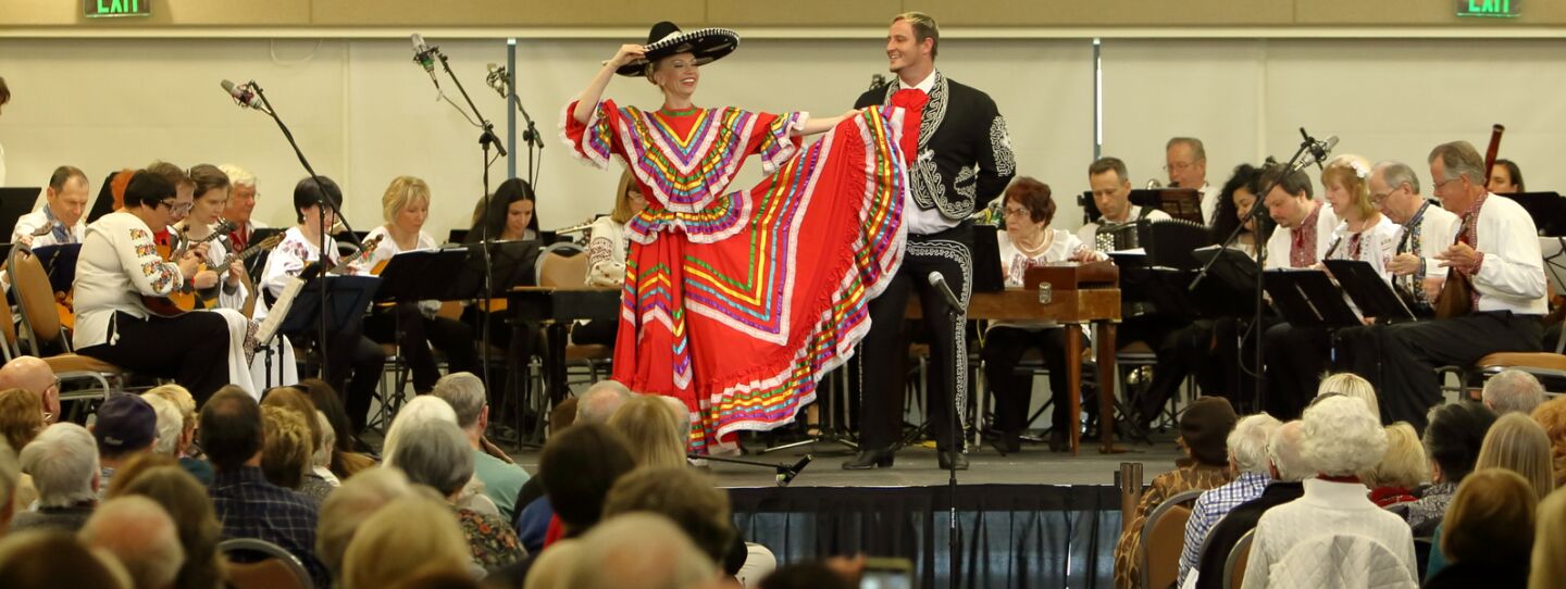 The Los Angeles Balalaika Orchestra plays as Larissa Nazarenko and Tyler Worth dance to a traditional Mexican song