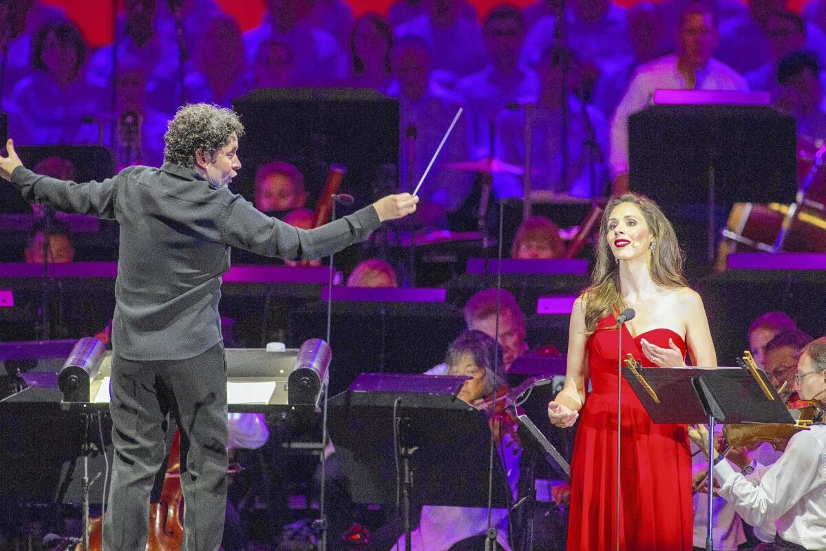 Conductor Gustavo Dudamel and mezzo-soprano Tamara Mumford perform at the Hollywood Bowl.